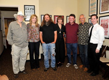 Group photo backstage at the tribute program
